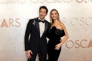 Adrien Brody and Georgina Chapman at 97th Annual Oscars - Arrivals - Source: Getty